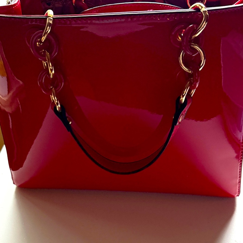 Red Patent Leather Tote.Matching wrist wallet.Both brand new.small dentsinwallet